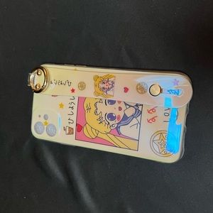 Phone case for iPhone 11. Hand strap on back